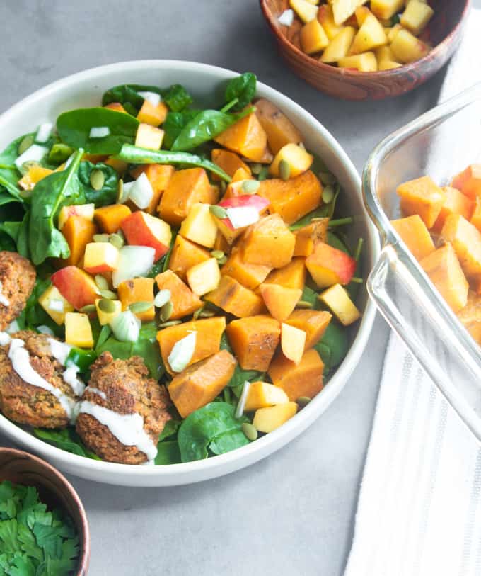 sweet potato buddha bowl with peach salsa and falafel